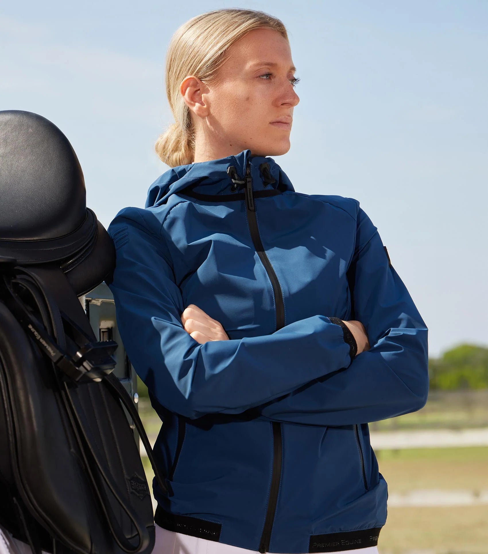 PREMIER EQUINE Spinto Waterproof Jacket - Imperial Navy. Equestrian rain coat, women's riding gear, durable, breathable. Shop Equiflair!