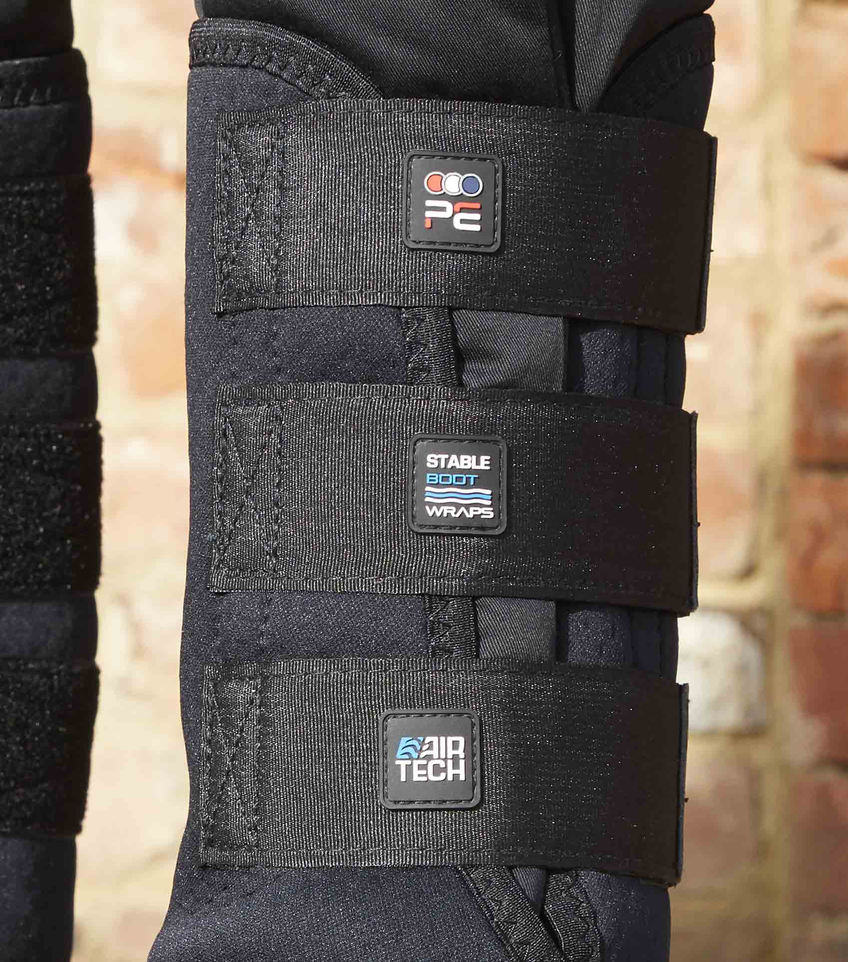 Premier Equine Black Stable Boots with Air-Tech Wraps for Horse Leg Support & Cooling.