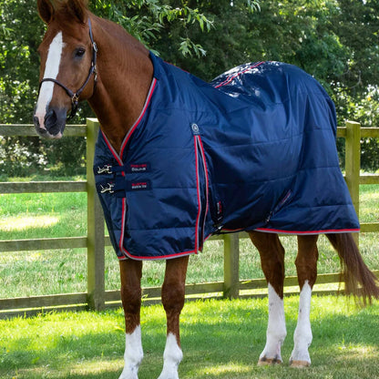 Horse in PREMIER EQUINE Stable Buster Lite 100g Navy Rug - Equiflair
