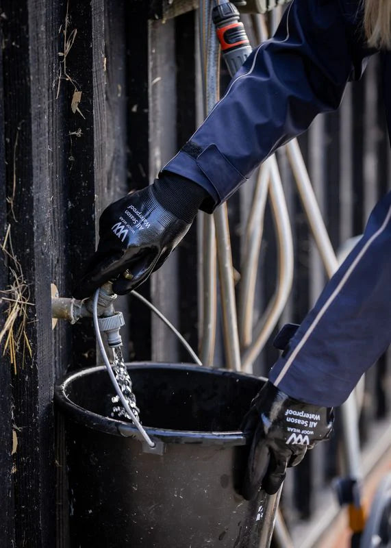 WOOF WEAR Waterproof Gloves: Filling Bucket with Water in Black All Season Yard Gloves. Equiflair.