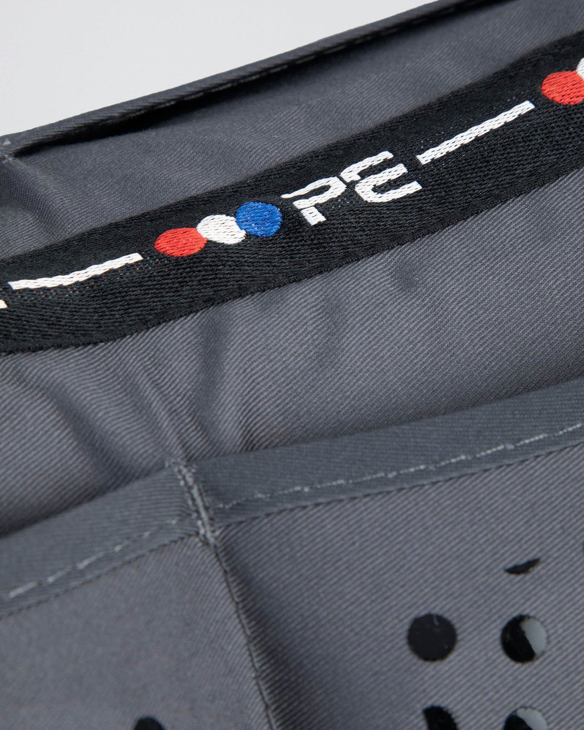 Premier Equine Tech Grip Pro Anti-Slip Correction Saddle Pad Grey - Close-up of branding, stitching, and grip details