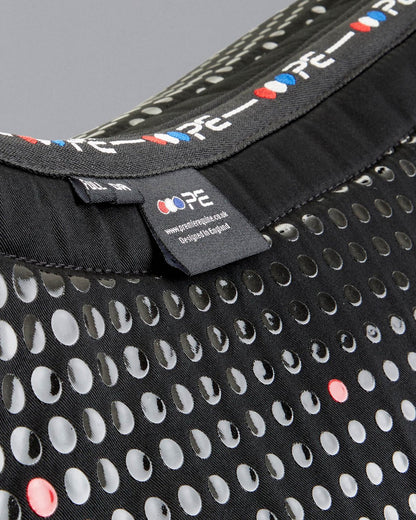 Premier Equine Dressage Saddle Pad: Anti-Slip Tech Grip Design, close-up of PE logo. Ideal saddle pad for enhanced stability.