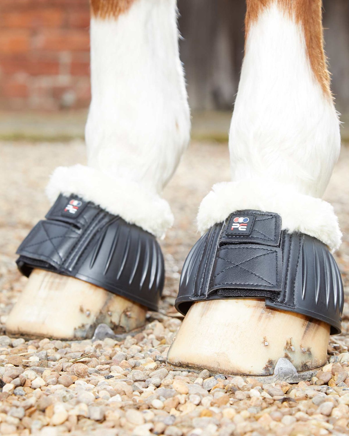 PREMIER EQUINE TECHNO WOOL Rubber Bell Over Reach Boots - Black horse boots for protection. Equiflair