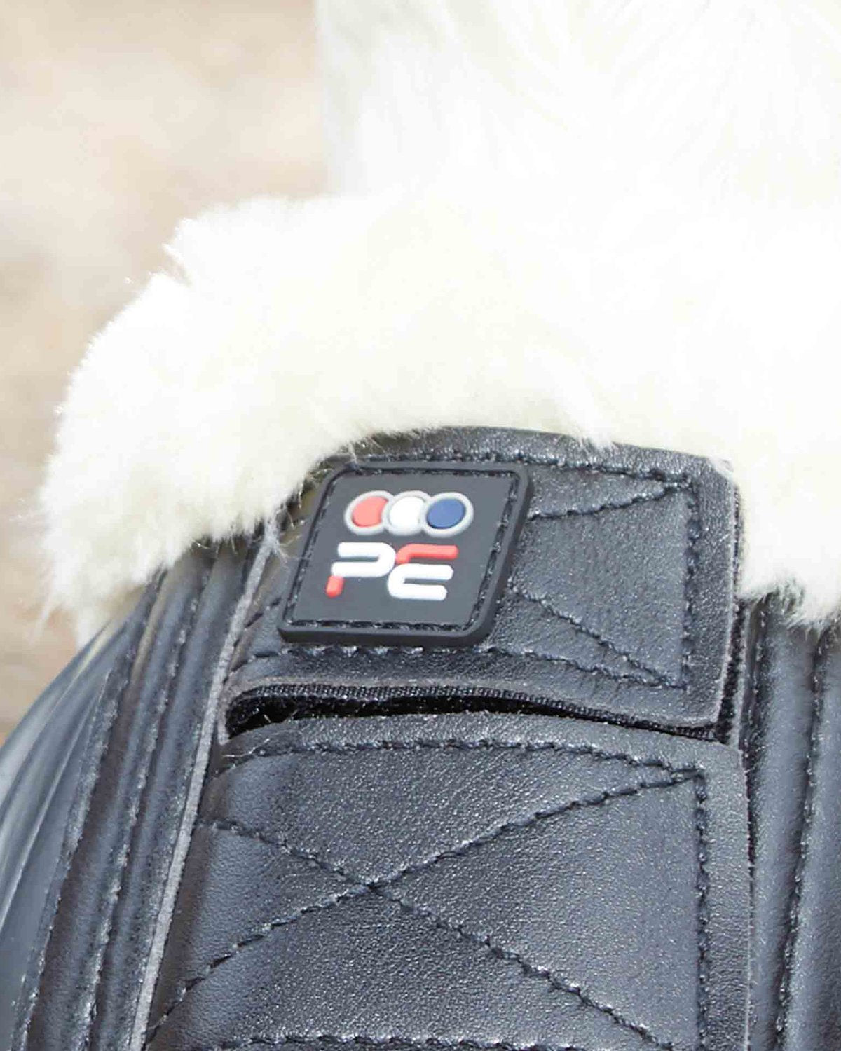 Premier Equine black rubber over reach bell boots with Techno Wool lining for shock absorption & equine impact protection.