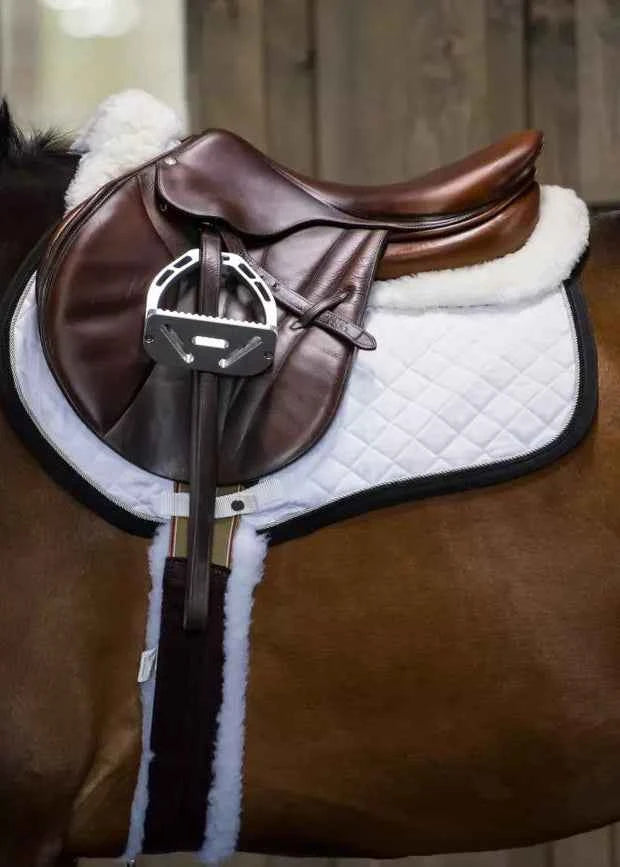 ThinLine white sheepskin horse saddle pad with stirrup, improving rider comfort & saddle fit.