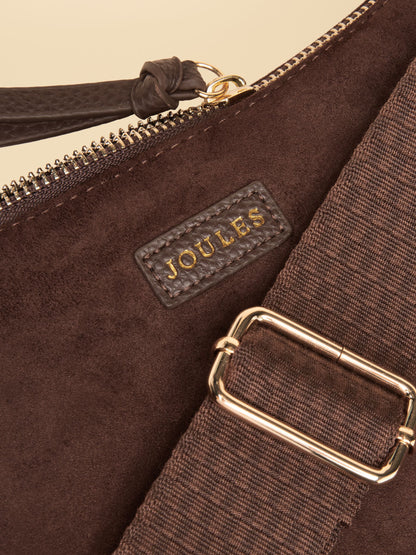 Joules chocolate brown suedette moon crossbody bag with gold-tone hardware.