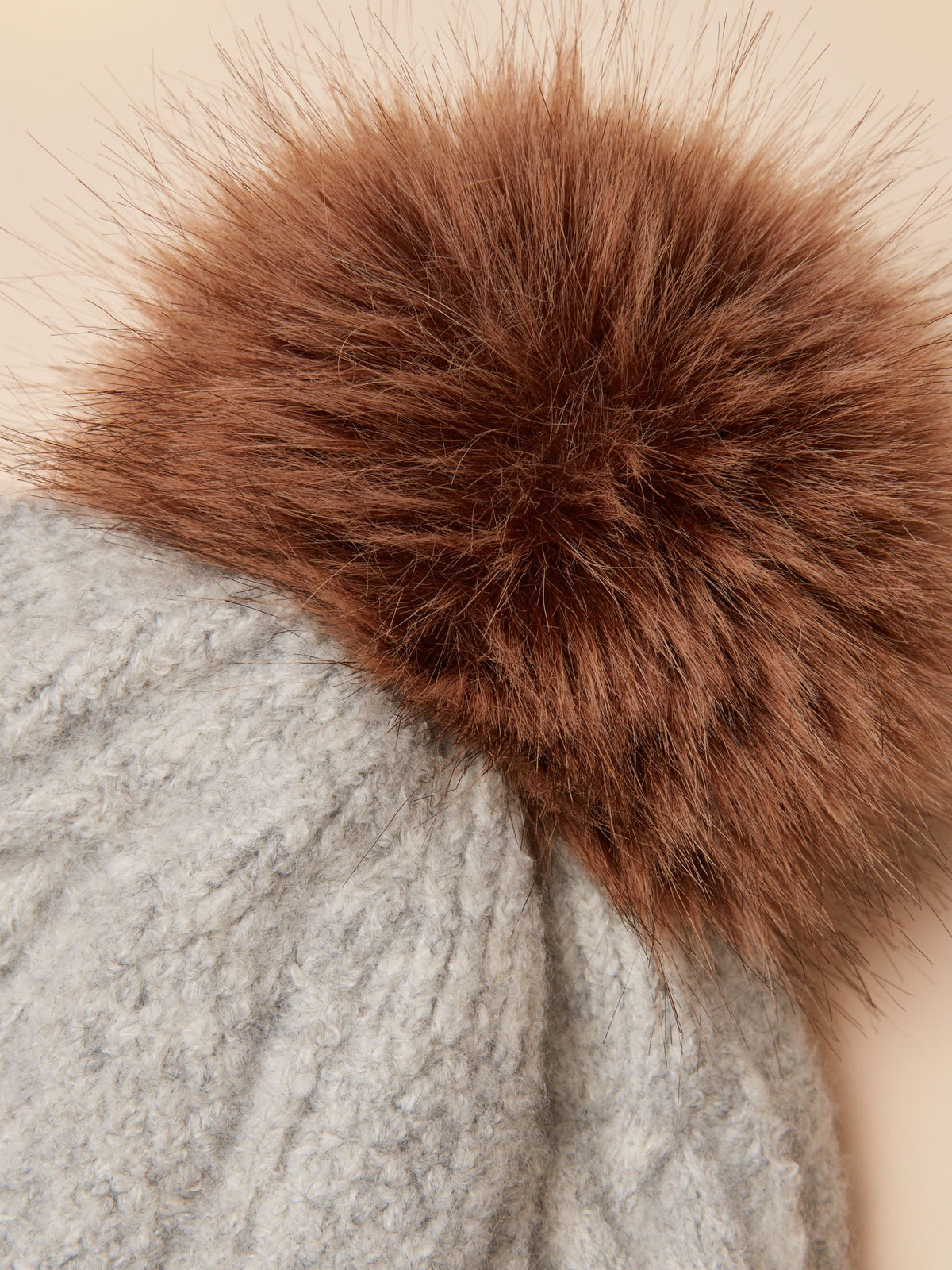 Joules grey cable knit bobble hat with fluffy brown faux fur pom pom