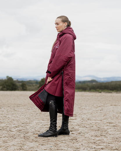 EquiDry Evolution Plum Riding Coat: Women's waterproof, fleece-lined equestrian coat for warmth & protection in all weather.