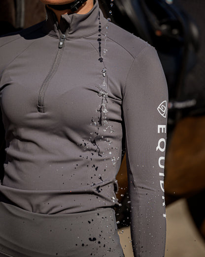 Equidry Women's Water Repellent Base Layer - Grey, White Logo, Water Droplets Showing Repellency