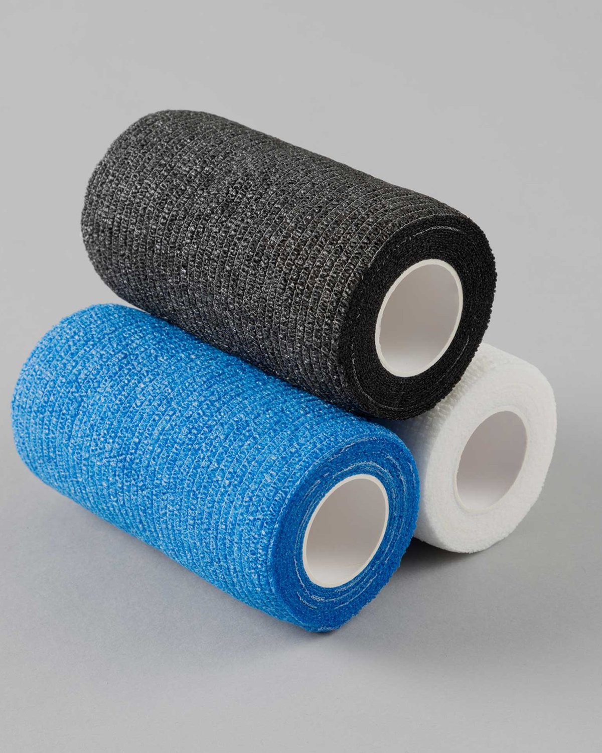 Vet Wrap Bandages: Black, Blue, & White Cohesive Bandages for Wound Care & Equestrian Support. Equiflair Tack Room Essential