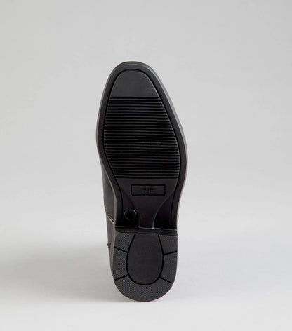 Black Paddock Boot Sole: Anti-Slip, Molded, Equestrian, Junior Riding Boot. PE Branding Visible.