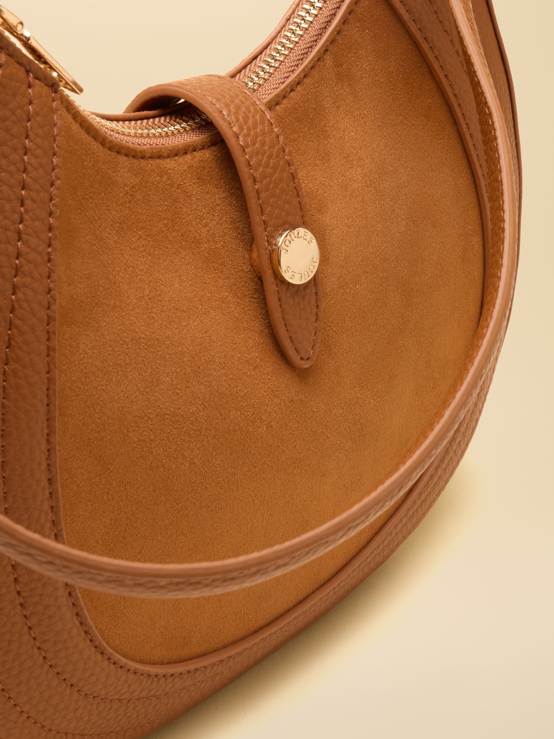 Tan suede leather crossbody saddle bag with gold Joules logo button detail