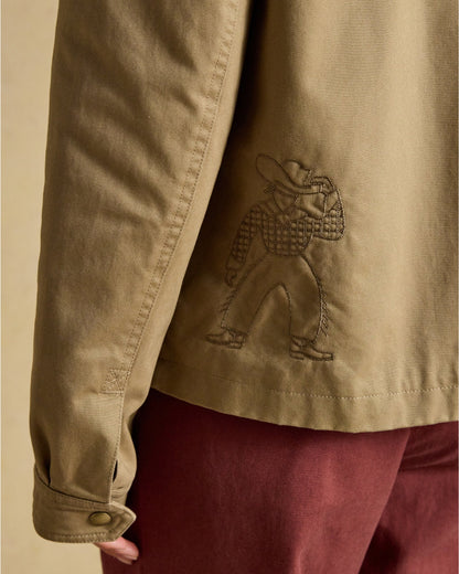 Joules women's tan barn jacket with embroidered cowboy detail on back