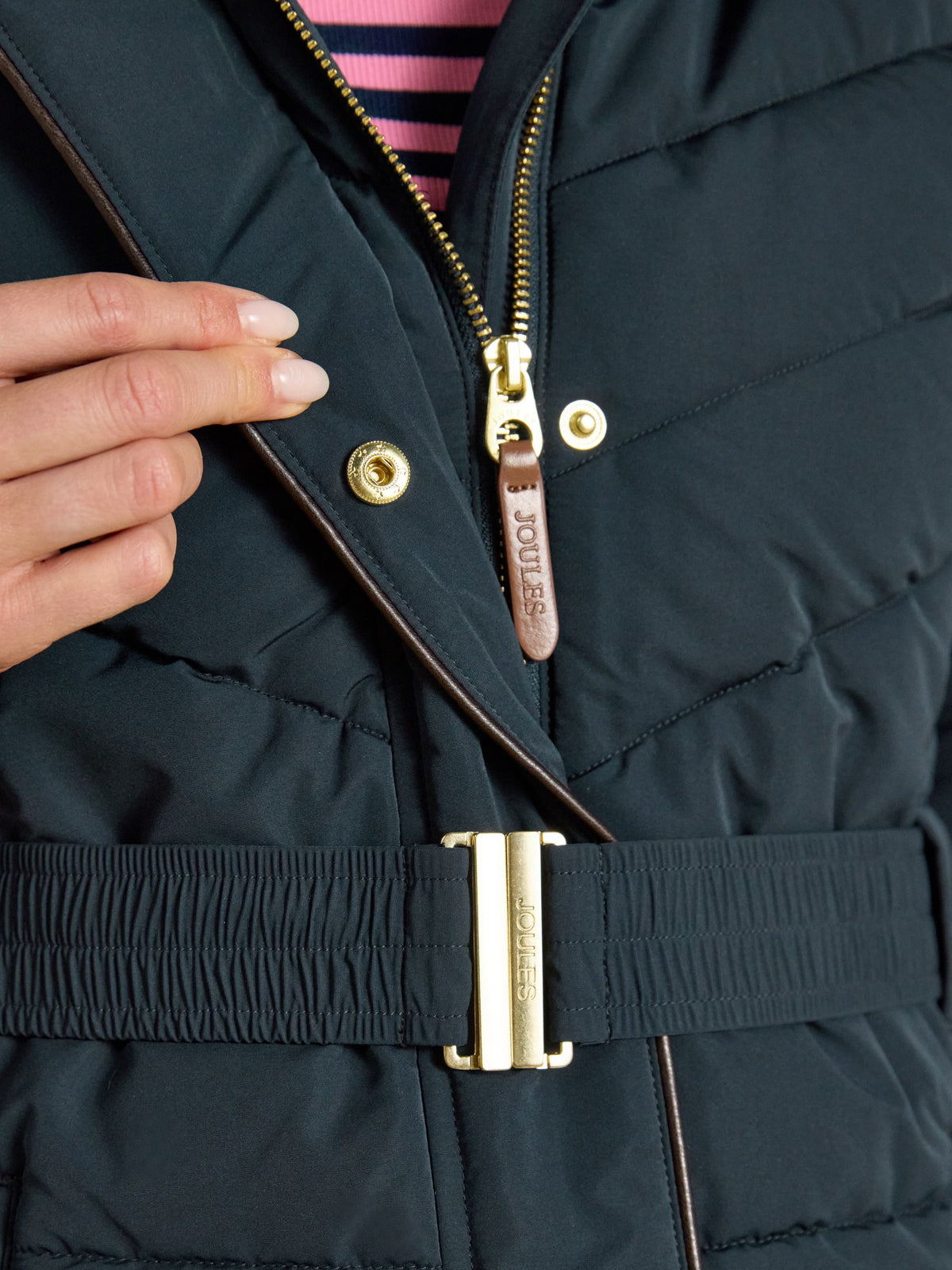 Women's Joules navy showerproof padded coat with gold buckle belt and leather zipper pull