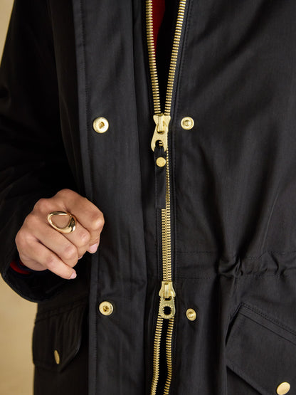Joules Portwell black fleece-lined waterproof raincoat with gold zipper detail
