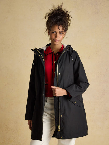 Joules women's black fleece lined waterproof raincoat with hood, perfect for rain.