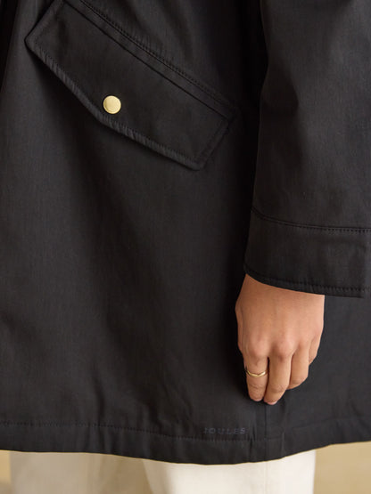 Joules women's black waterproof raincoat, fleece lined, hooded, adjustable waist, button pocket detail