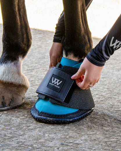 Woof Wear Ultra Overreach Boot being fitted on horse hoof - Kevlar protection, Equiflair