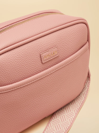 Pink faux leather Joules Trent crossbody bag with adjustable strap
