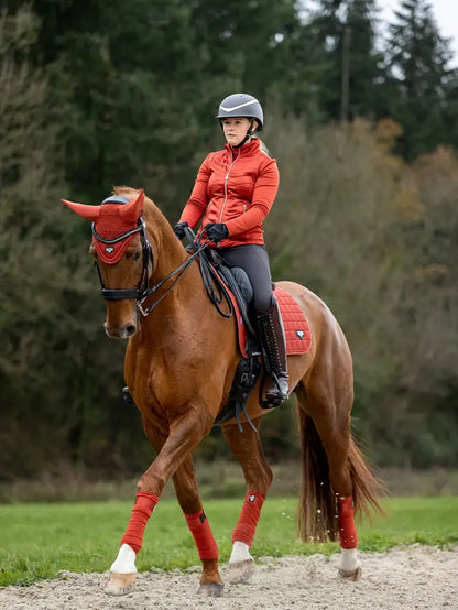 LeMieux Loire Classic Dressage Square Sienna: Equestrian horse riding saddle pad in burnt orange color. Stylish performance wear.