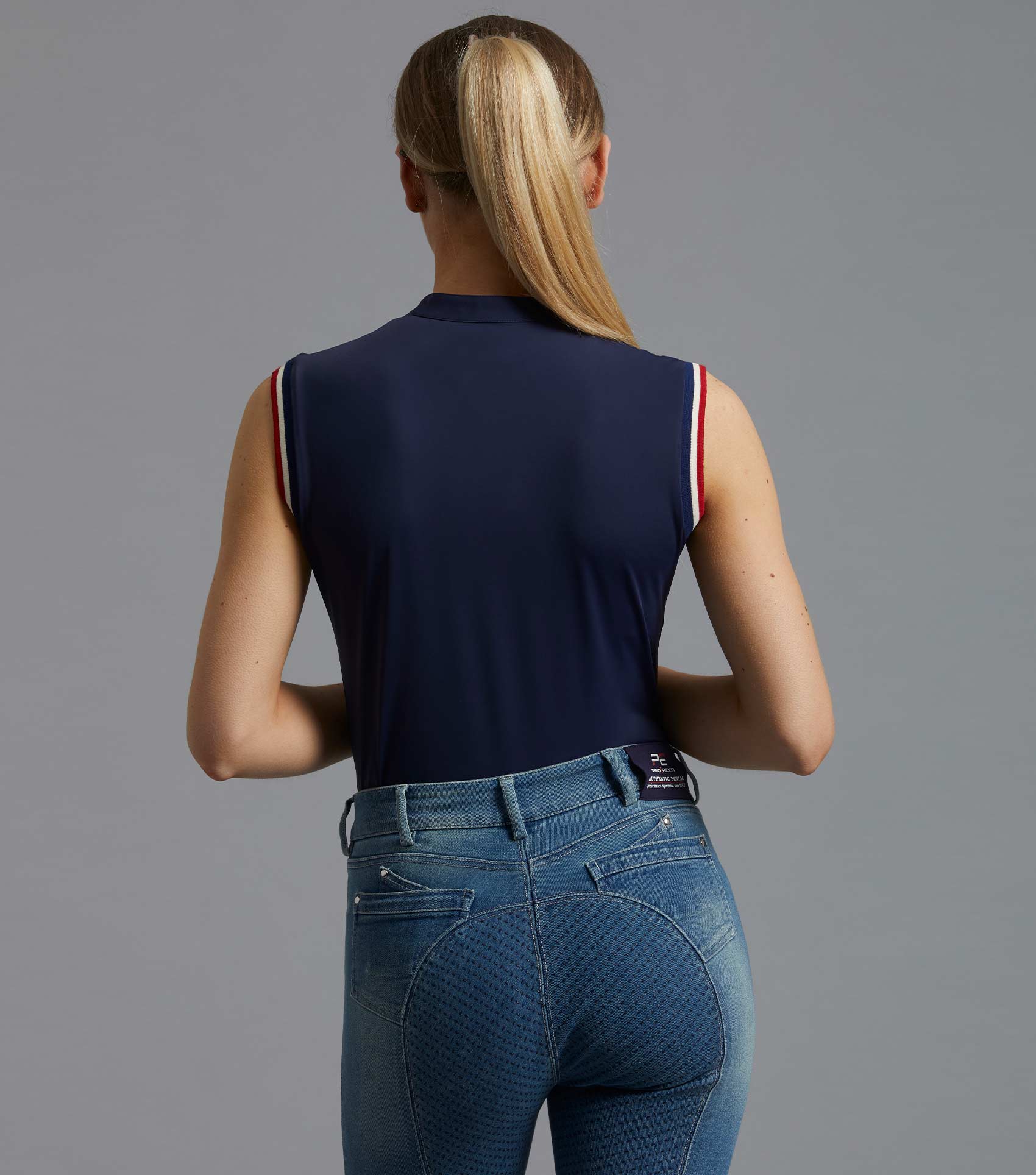 Premier Equine Alito Navy Sleeveless Riding Top. Equestrian Sportswear. Breathable, 4-way Stretch, Zip Closure. Stylish Rider Apparel.