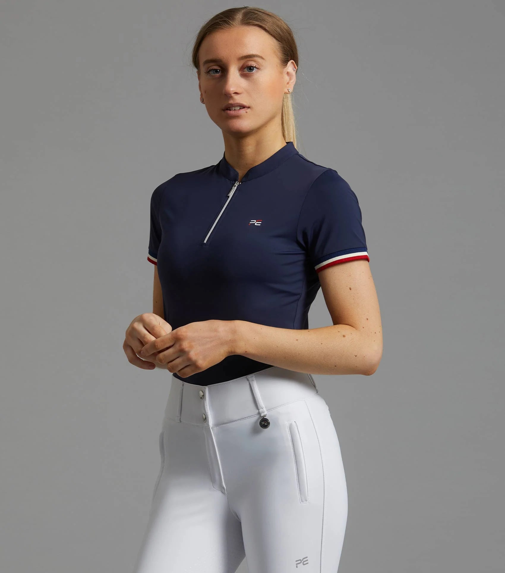 Premier Equine Ladies Navy Riding Top with White Breeches | Equestrian Apparel