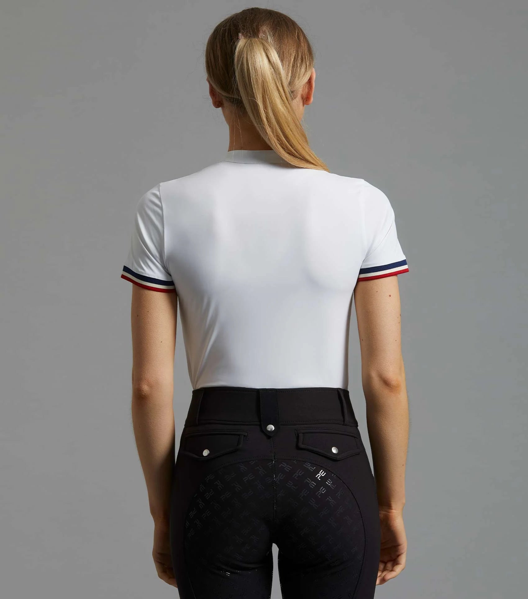 Premier Equine Allegra Ladies White Short Sleeve Riding Top. Equestrian Apparel for Women. Comfort, Style, and Performance.