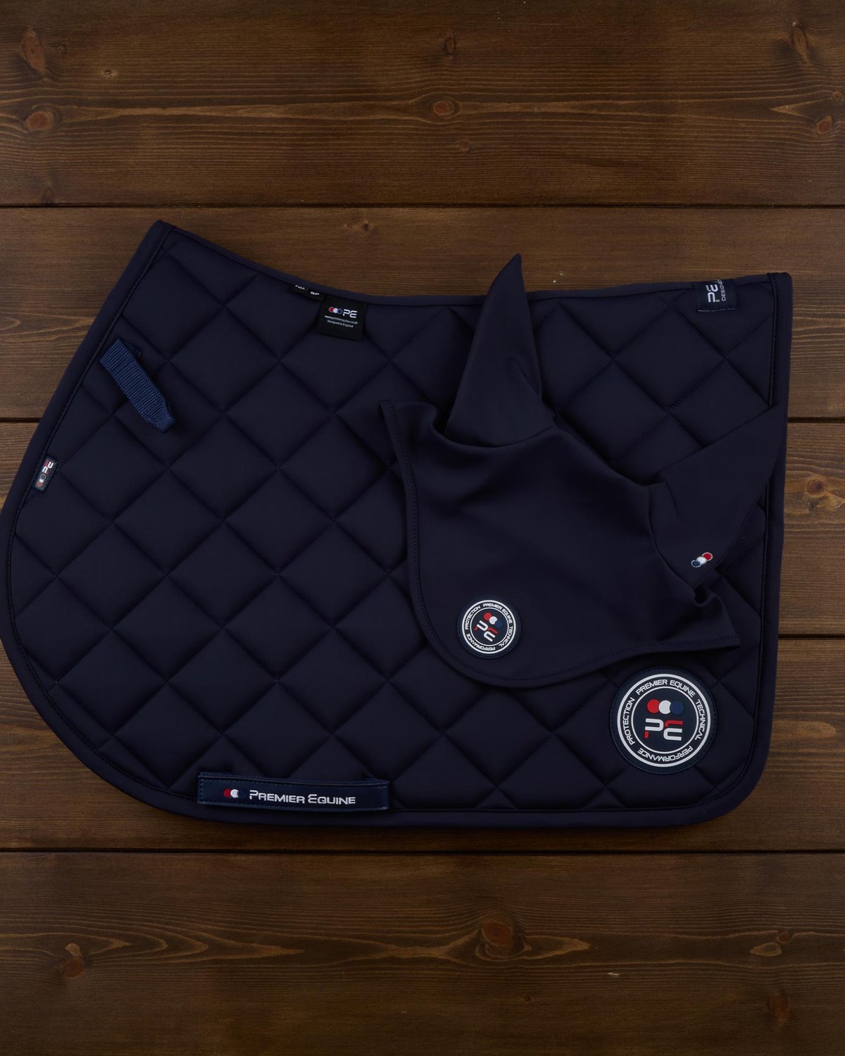 PREMIER EQUINE Atlas Close Contact GP/Jump Saddle Pad - Navy. Equestrian horse riding pad with bamboo lining from Equiflair.