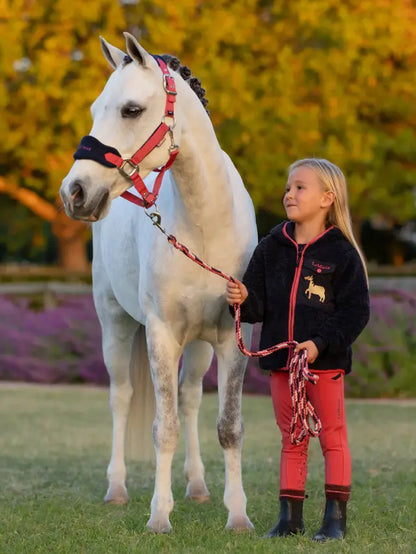 Girl with White Horse wearing Lemieux Equestrian Apparel - Equiflair