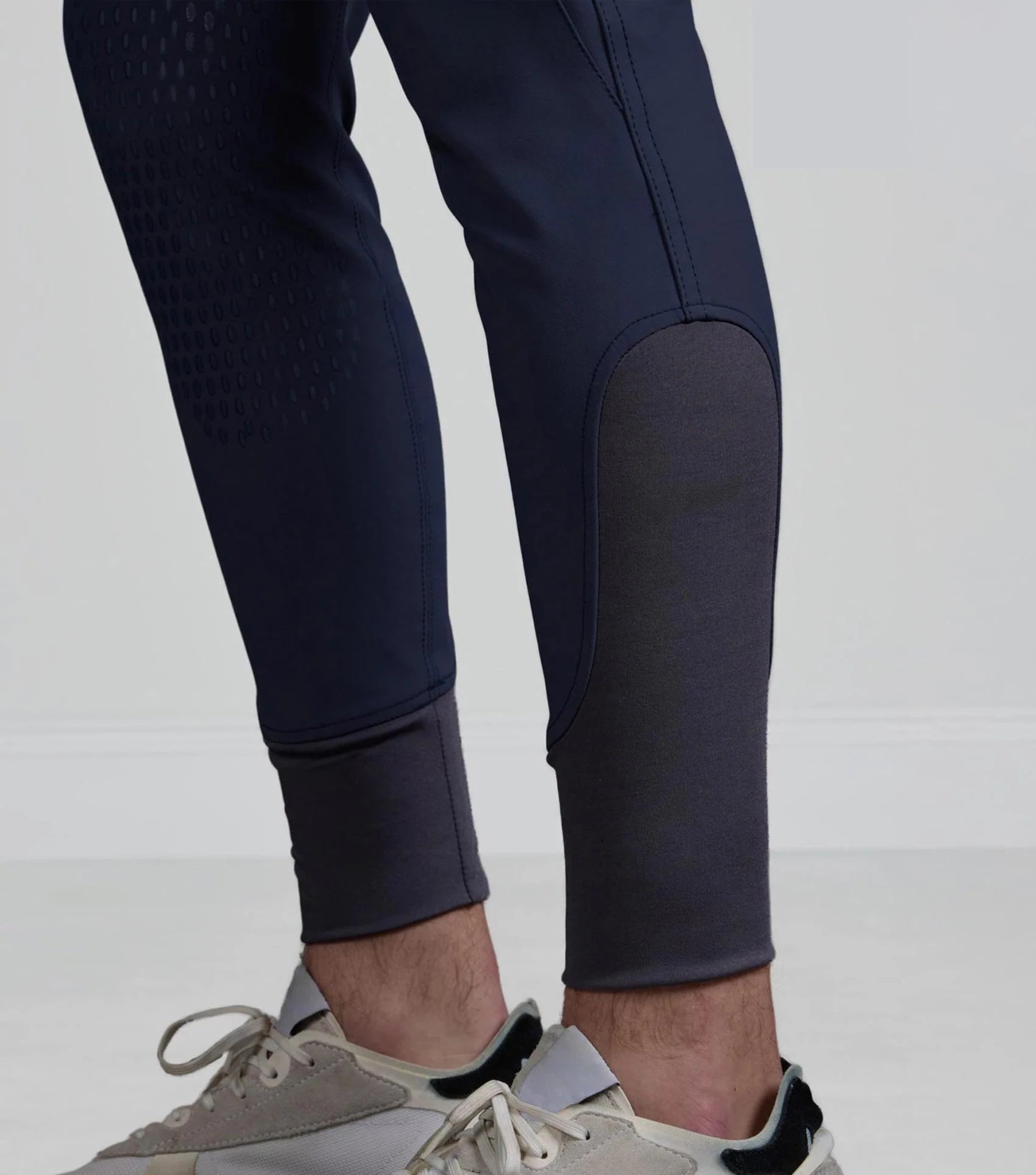 Premier Equine Barusso Men's Navy Riding Breeches with Gel Knee Patches. Equestrian apparel for secure comfort in the saddle.