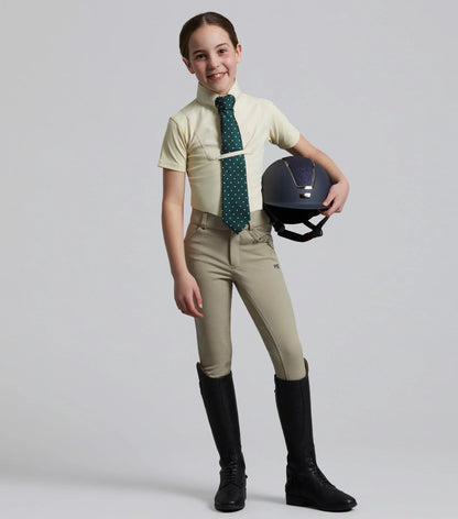 Girl Equestrian Outfit: Riding Breeches, Boots, and Helmet. Premier Equine Brand.