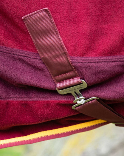 Burgundy Premier Equine Fleece Cooler Rug: Strap & Buckle Detail - Horse Clothing