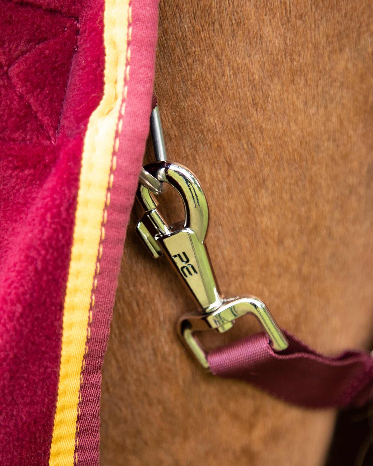 Premier Equine Buster Fleece Cooler Rug - Burgundy: Horse rug with clip detail. High-quality fleece horse cooler rug.