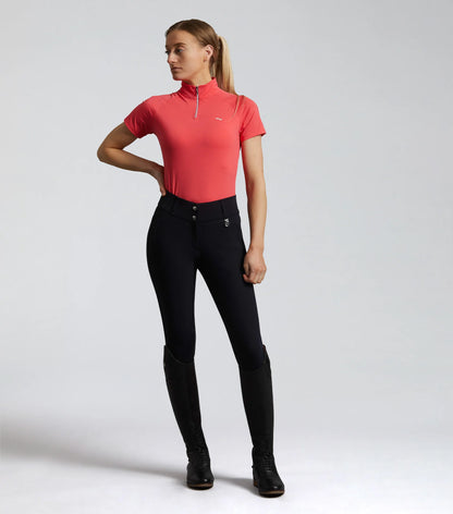 Premier Equine Carapello Riding Breeches: Woman in Equestrian Outfit. Comfortable, Stylish Black Breeches with Riding Boots