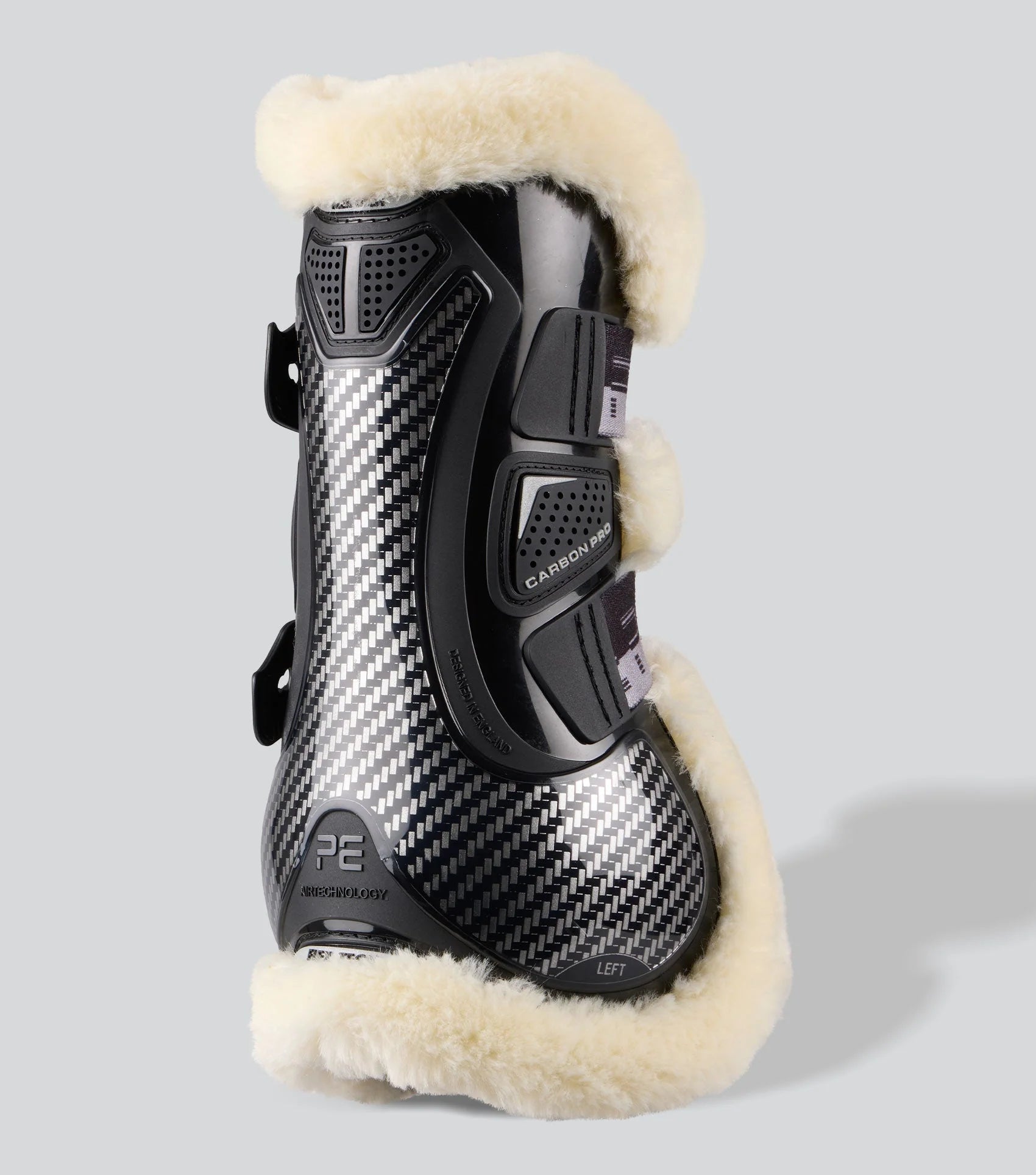 Premier Equine Carbon Pro Tendon Boots: Black horse jumping boots with techno wool lining. Shop Equiflair for ultimate protection!