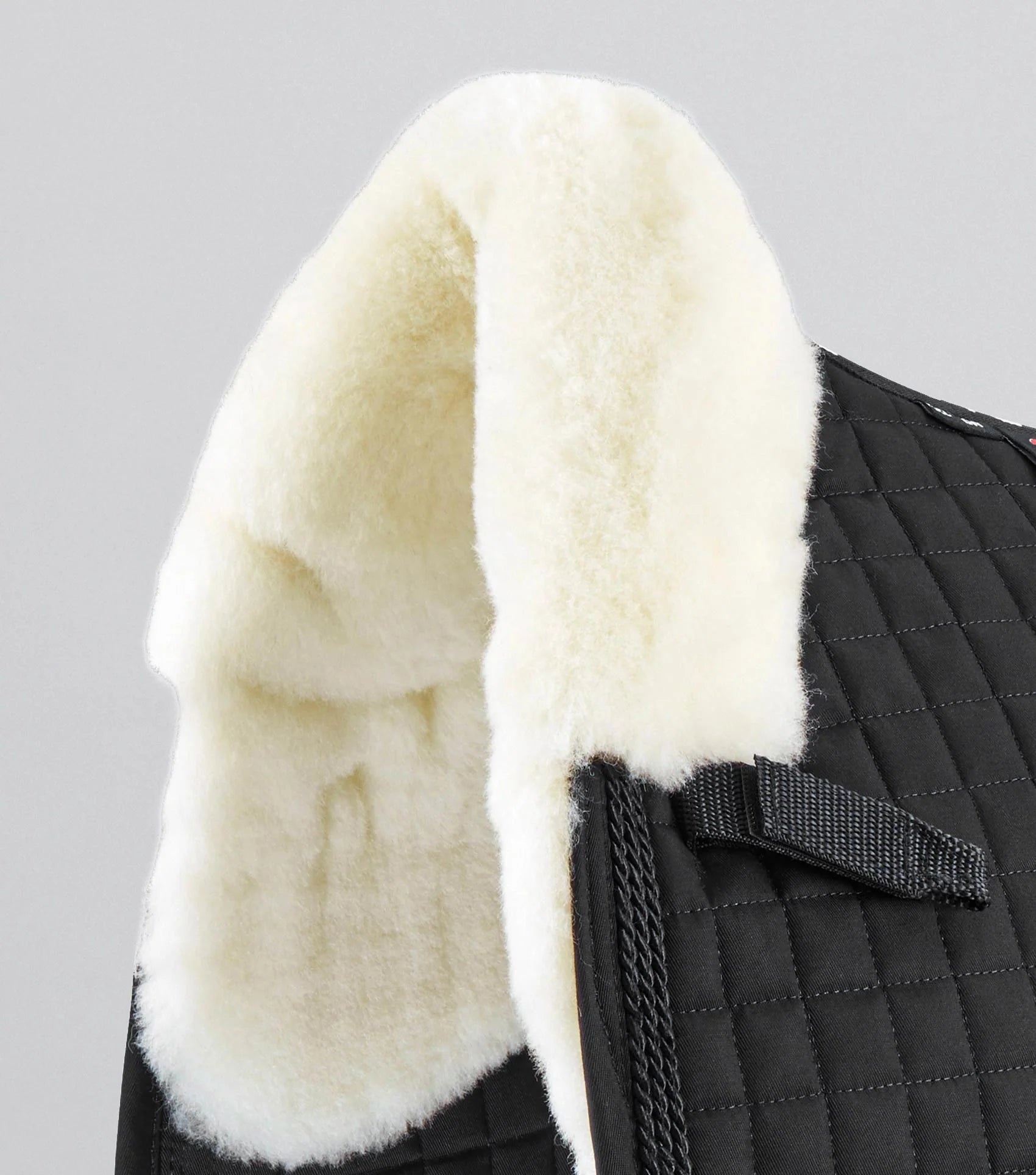 Premier Equine Merino Wool Dressage Saddle Pad - Black & Natural. Comfortable horse riding equipment.