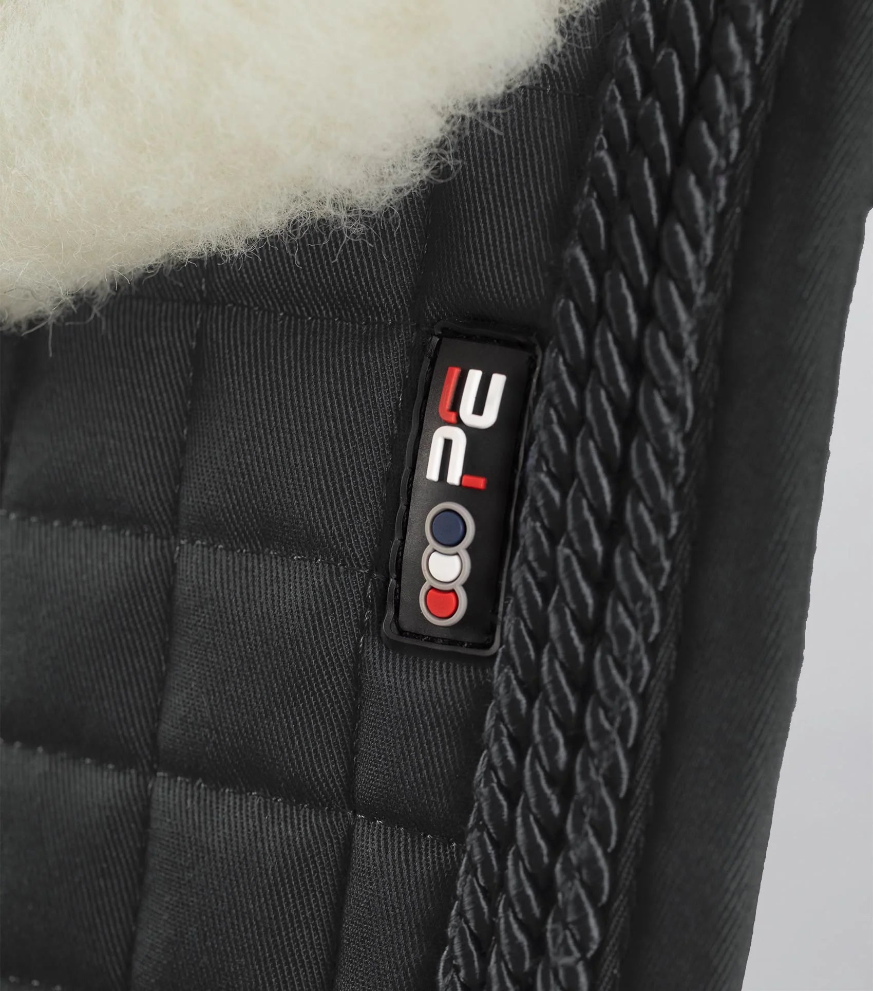 Premier Equine Merino Wool Dressage Saddle Pad - Black. High-quality equestrian equipment for horse riding comfort & performance.