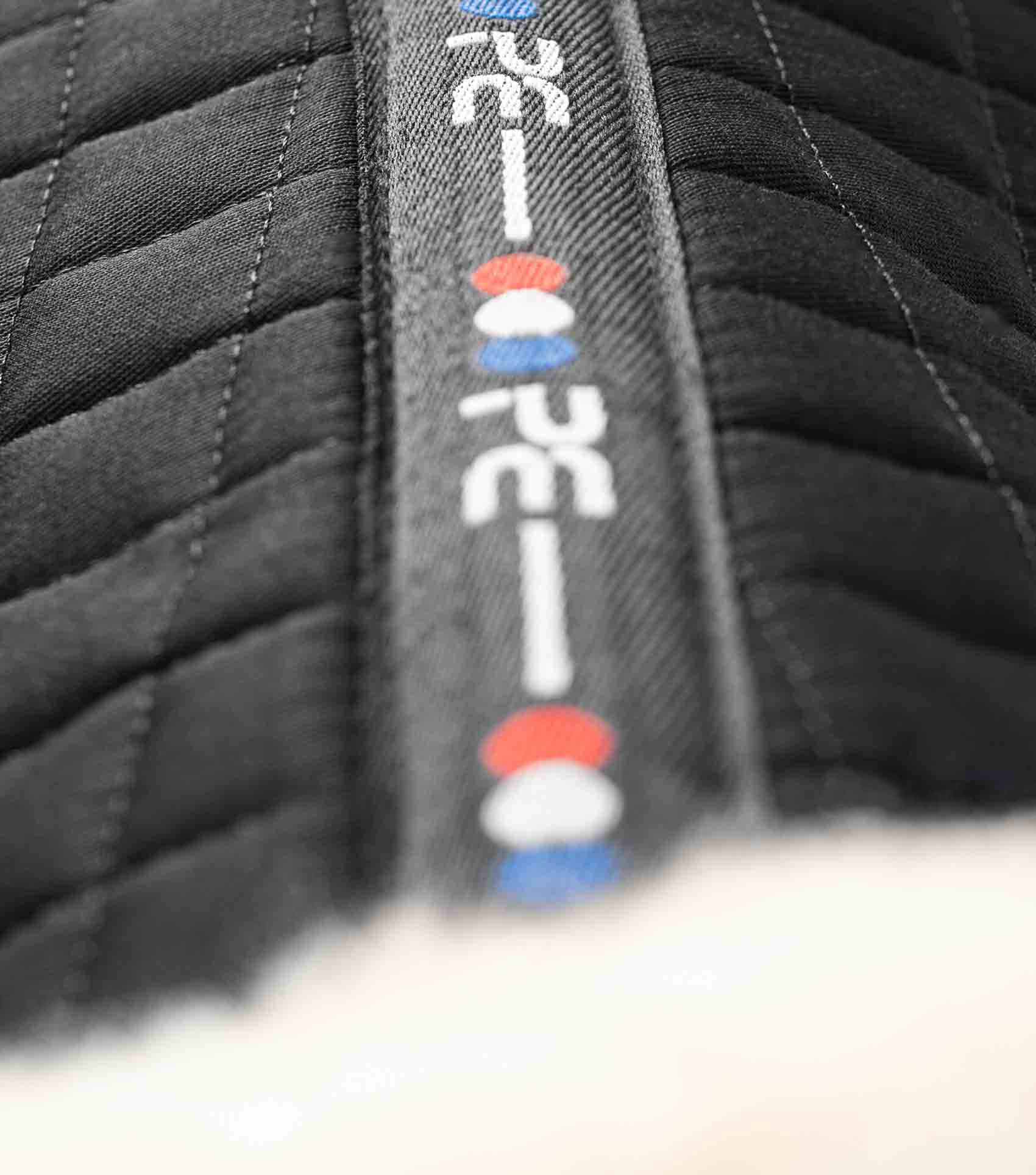 Premier Equine Merino Wool Dressage Saddle Pad - Black close up. High quality equestrian equipment.