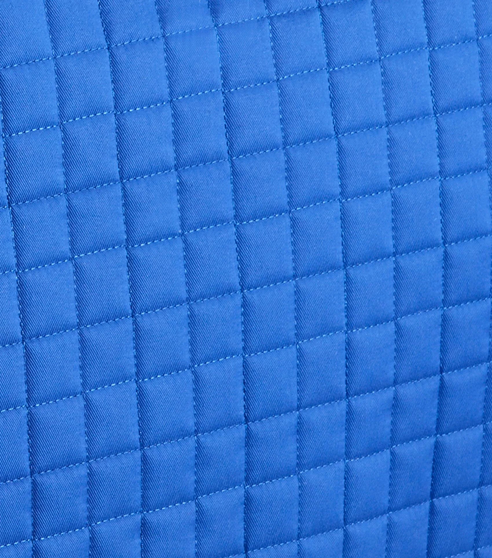 Blue Quilted Merino Wool Dressage Saddle Pad. Premier Equine close contact saddle pad. Equine Comfort and Performance.