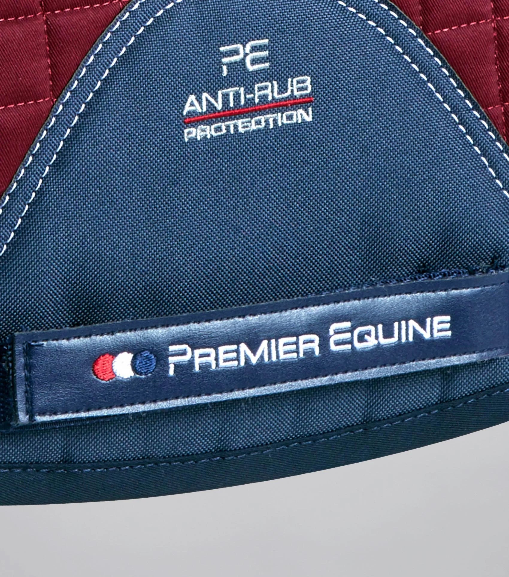 Premier Equine Merino Wool GP/Jump Saddle Pad - Burgundy & Navy. Anti-Rub Protection. Stylish Equestrian Saddle Pad for Comfort