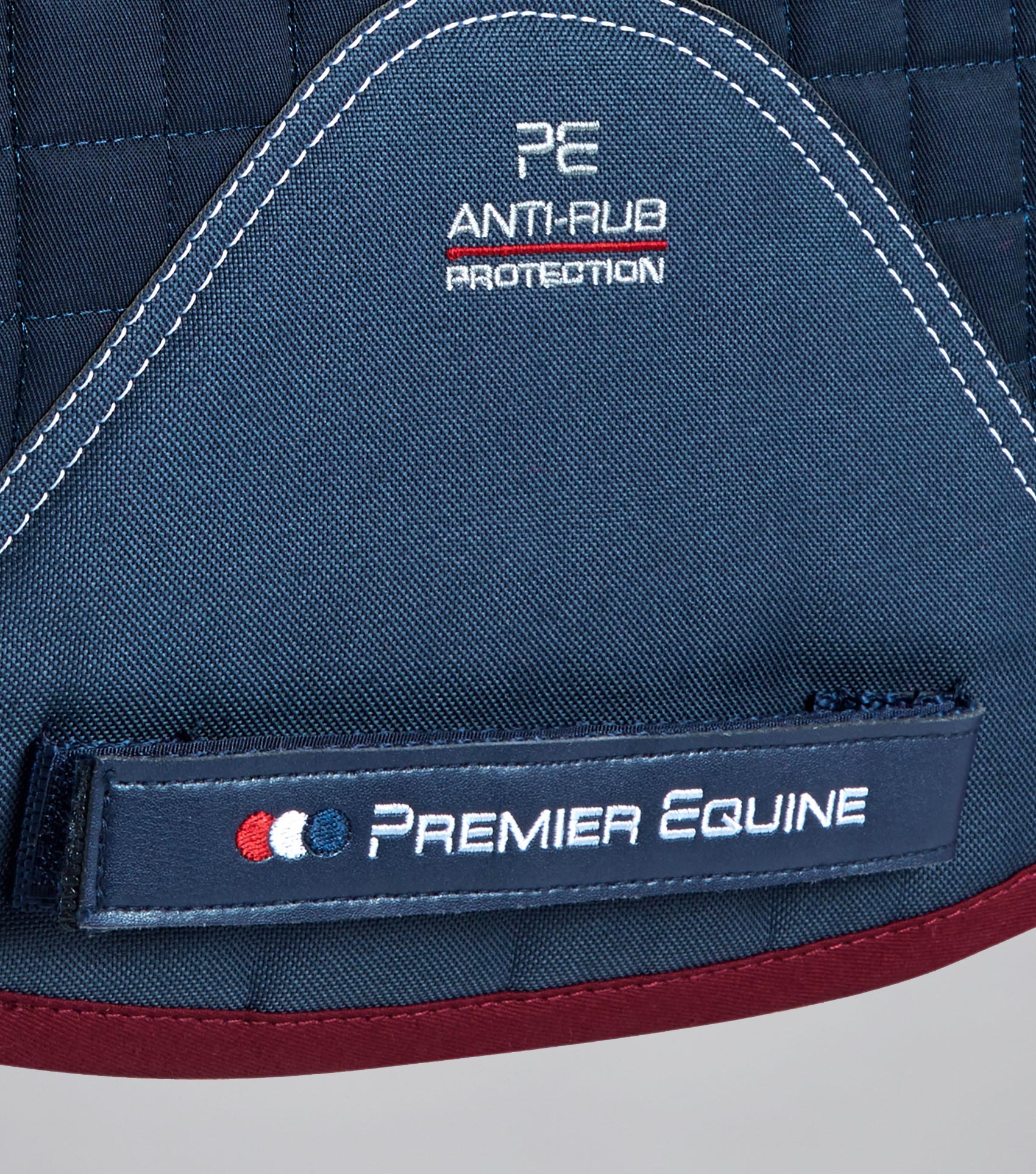 Premier Equine Navy/Burgundy Merino Wool Saddle Pad: Anti-Rub, Protection, GP/Jump Square