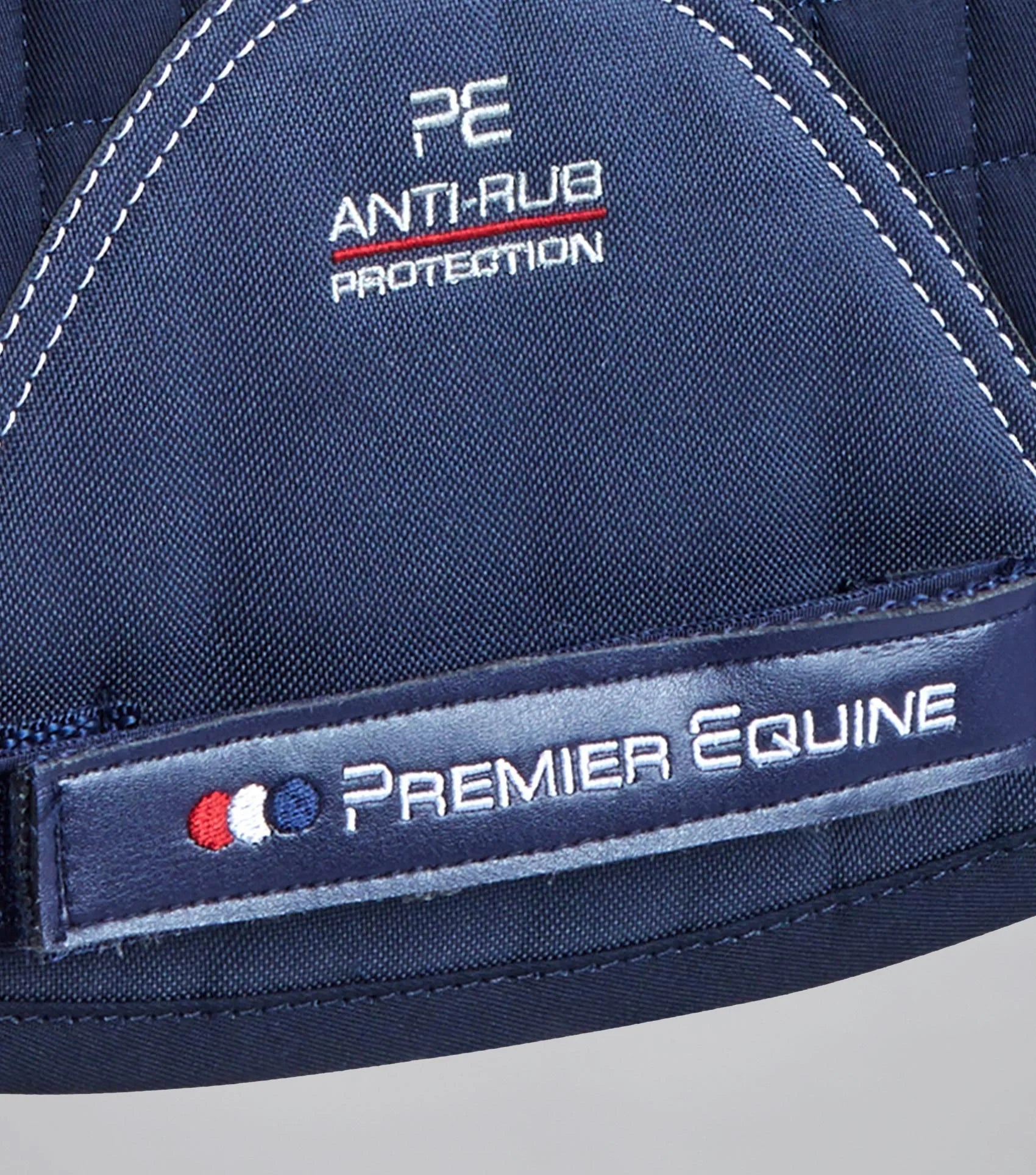 Premier Equine Navy Merino Wool Anti-Rub GP/Jump Saddle Pad. Horse riding comfort & protection.