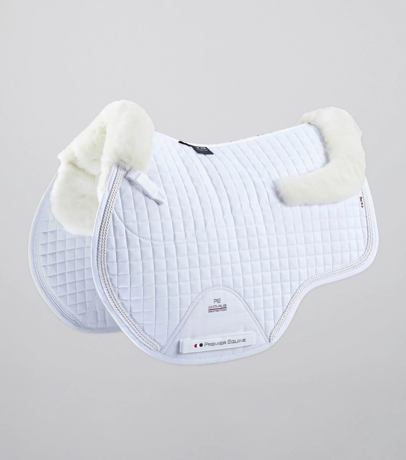 Premier Equine Merino Wool GP Jump Saddle Pad - White. High-quality, comfortable pad for horse riding and equestrian activities.