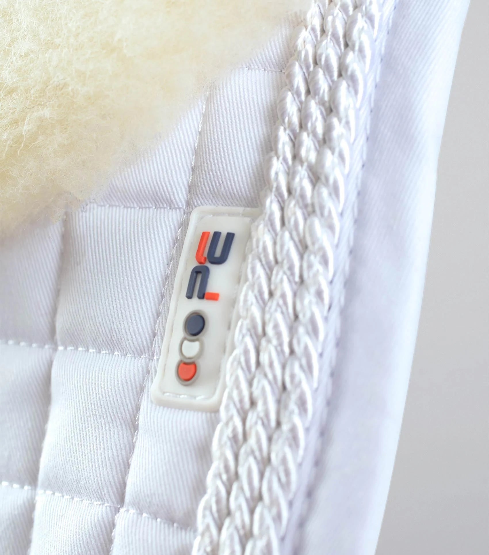 Premier Equine Merino Wool GP/Jump Square Saddle Pad - White. High quality equestrian saddle pad for horse riding