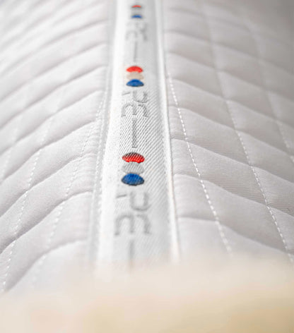 Premier Equine Merino Wool GP/Jump Saddle Pad: Close Contact, White with Natural Wool Detail