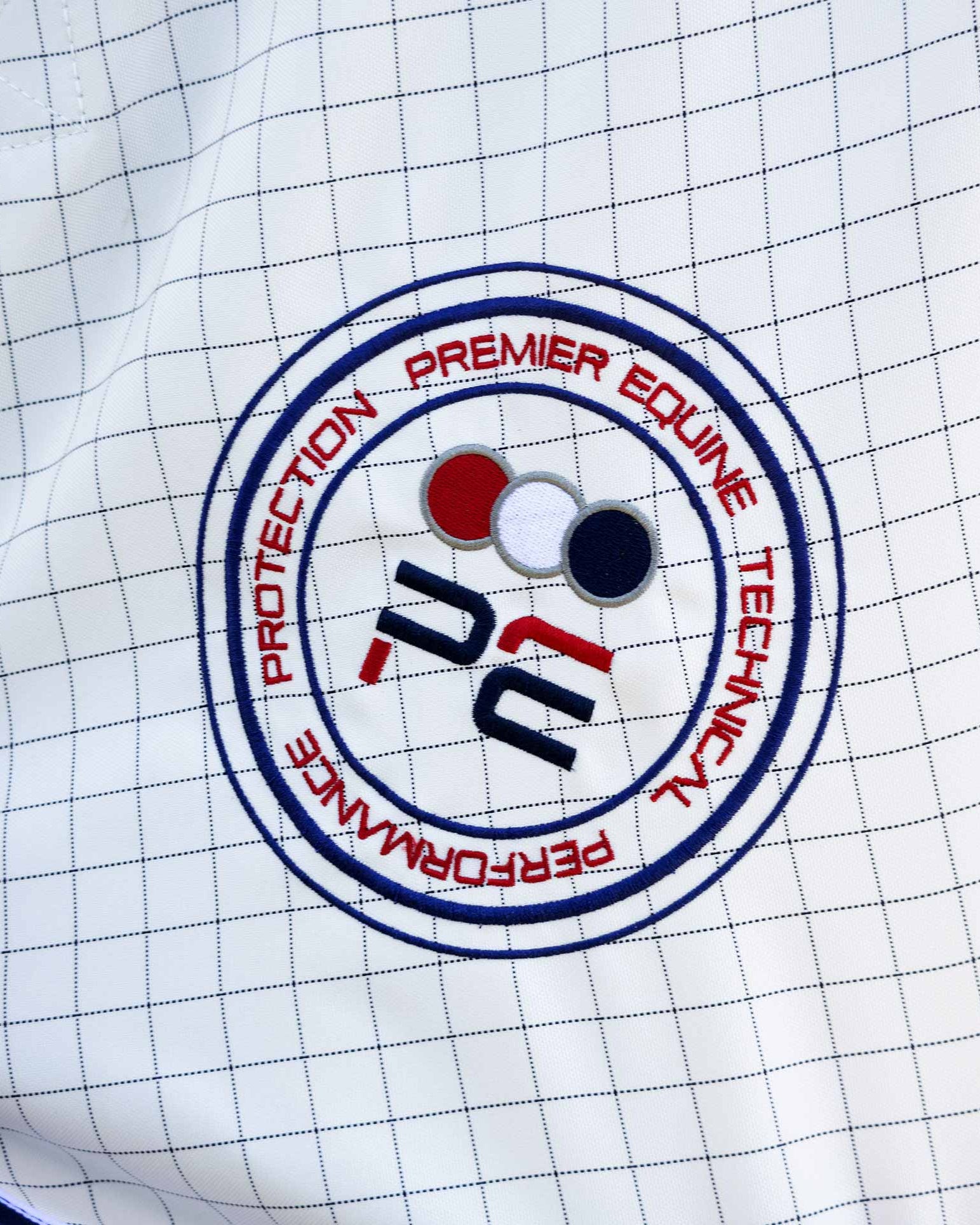 Premier Equine Stable Sheet Logo Detail | High-Quality Horse Rugs & Equestrian Supplies