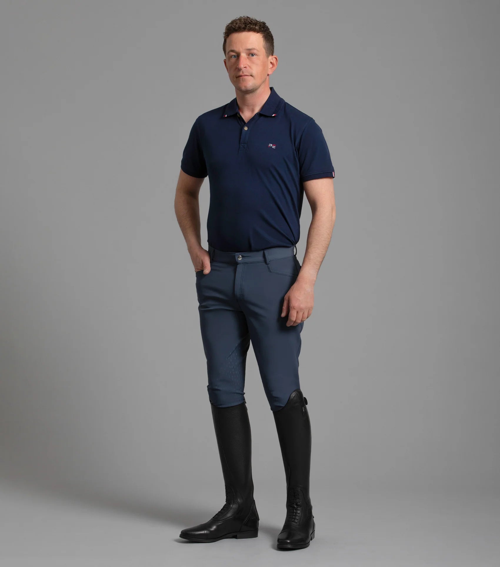 Premier Equine Emilio Men's Riding Breeches - Navy. Equestrian apparel with gel knee patch for improved grip.