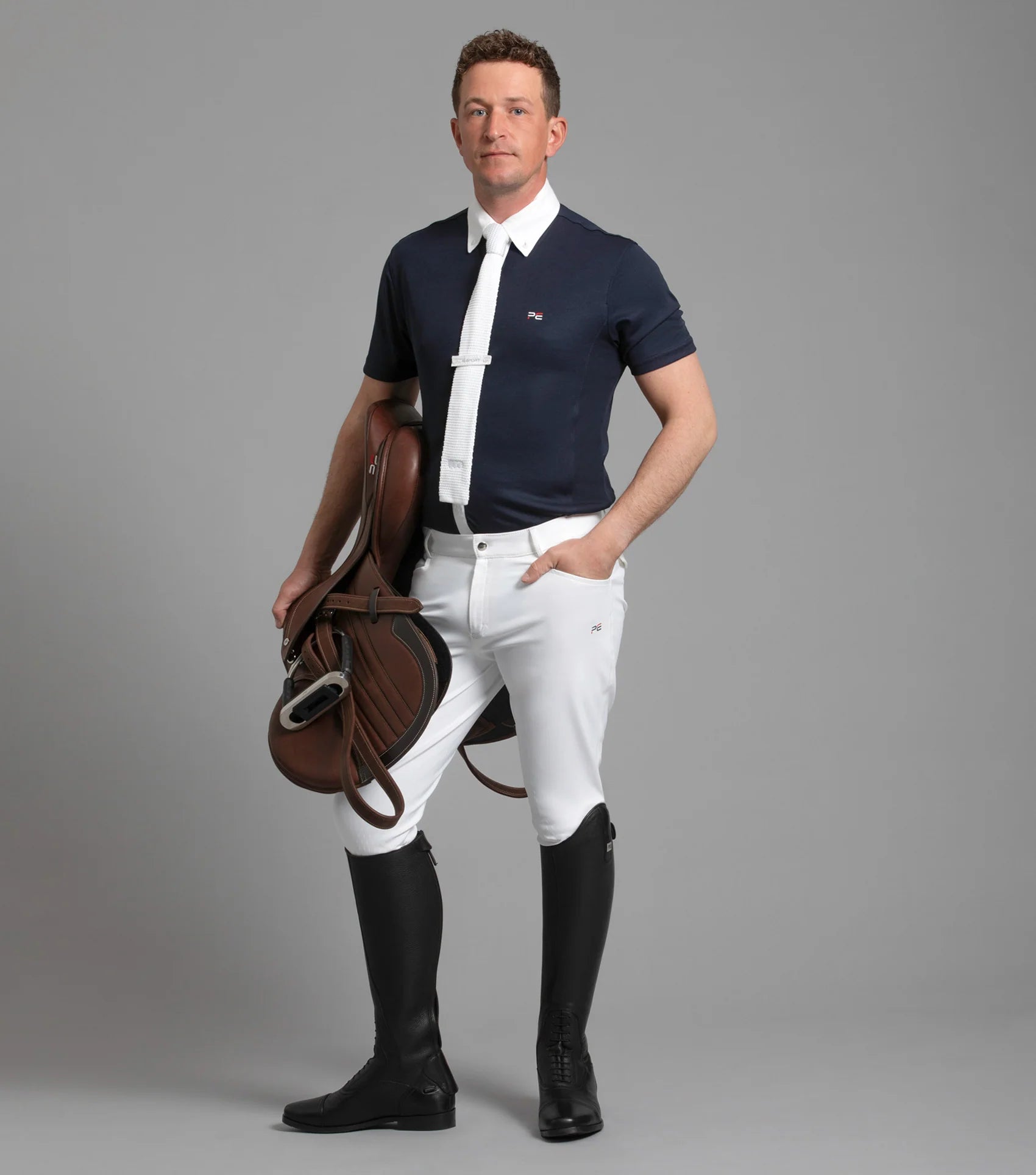 Man in Premier Equine Emilio White Gel Knee Competition Breeches | Equestrian Riding Apparel