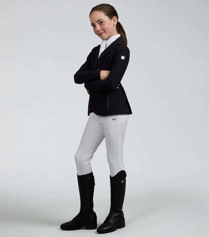 Girls Equestrian Jacket: Black Premier Equine Competition Riding Coat by Equiflair. Girl in stylish riding attire.