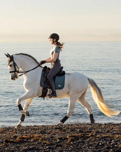 LEMIEUX EARTH Ocean Dressage Saddle Pad from Equiflair: Horseback riding on the beach. Sustainable equestrian gear. 